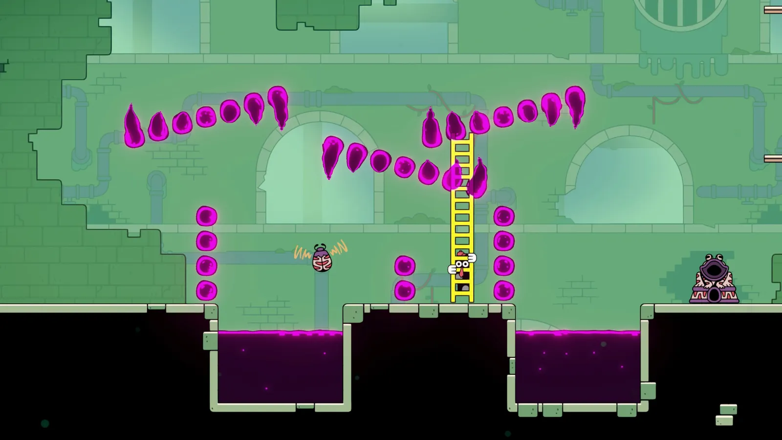 A wide green chamber lined with pink spikes, the ladder standing upright beside a dark drop